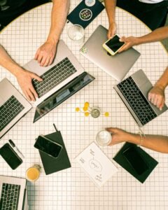 Photo Of People Using Laptop